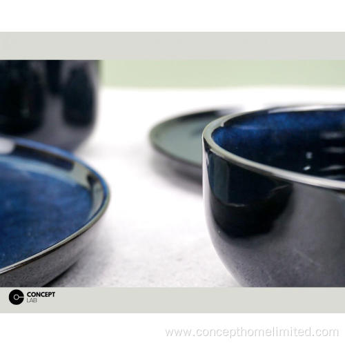 Reactive glazed stoneware dinner set in Dark blue